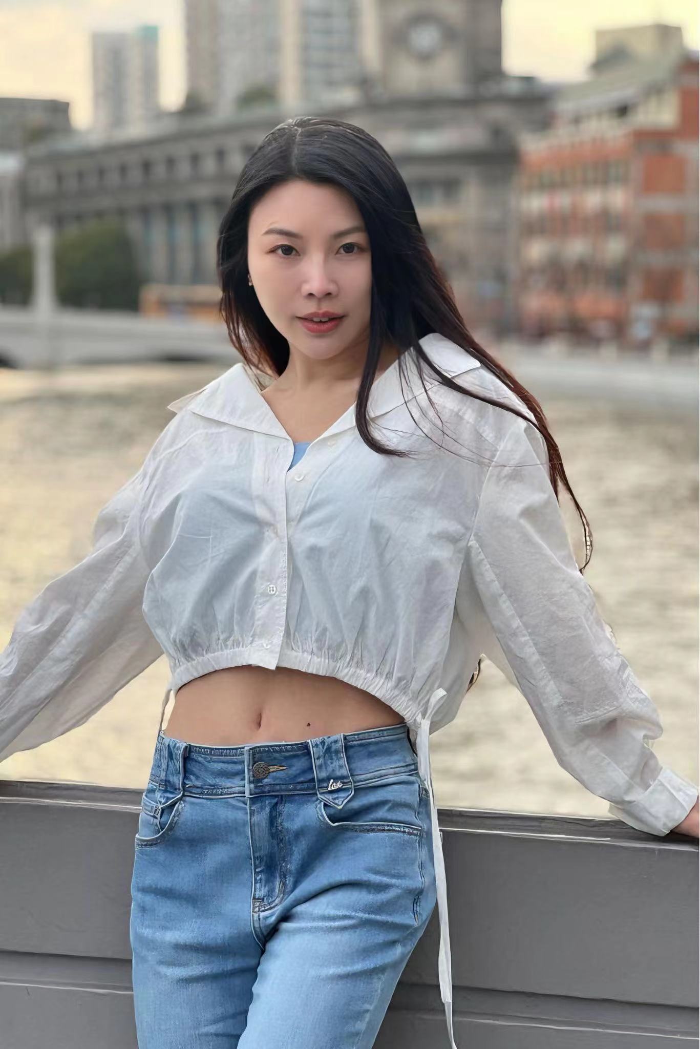夏款牛仔微喇褲